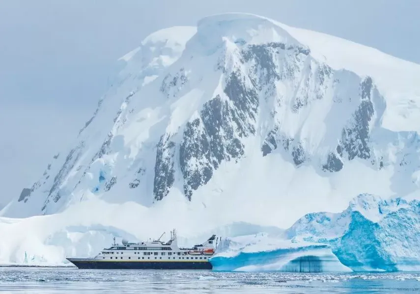 Iceberg and Ship in Antarctica 